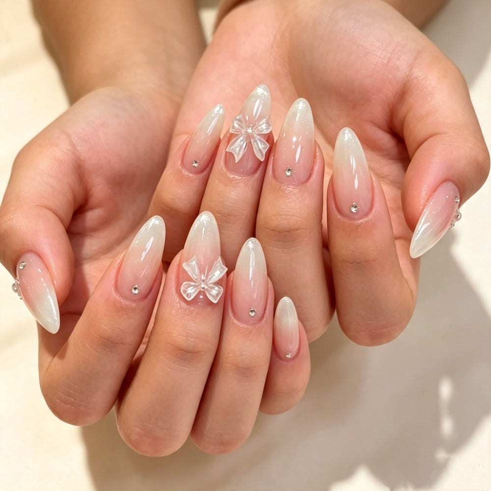 Elegant Press-On Nail Set with Decorative Bow and Gem Accents Stornfield