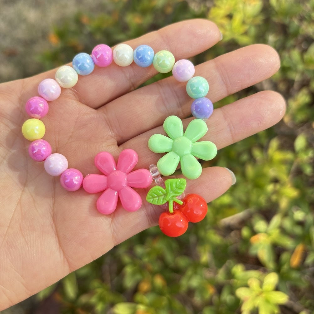 Colorful bracelet with flower charms Stornfield