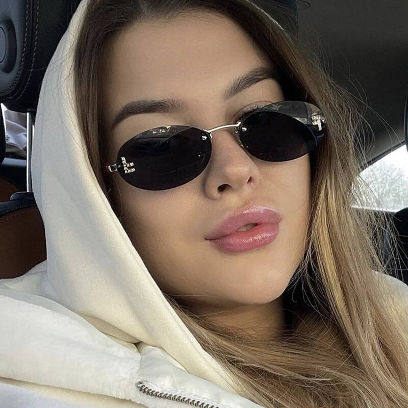 Sleek Metal Oval Sunglasses Stornfield