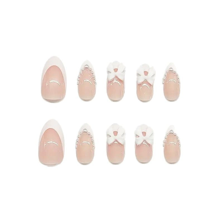 Artistic Press-On Nail Design with Bow Accents Stornfield