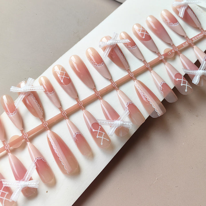 Artificial nail tips with romantic lace decorations Stornfield