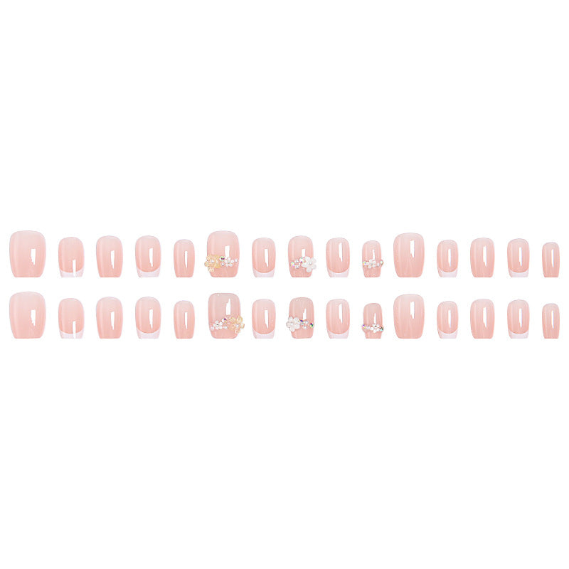 Nail set with elegant flower appliqués and exquisite glitter embellishments Stornfield