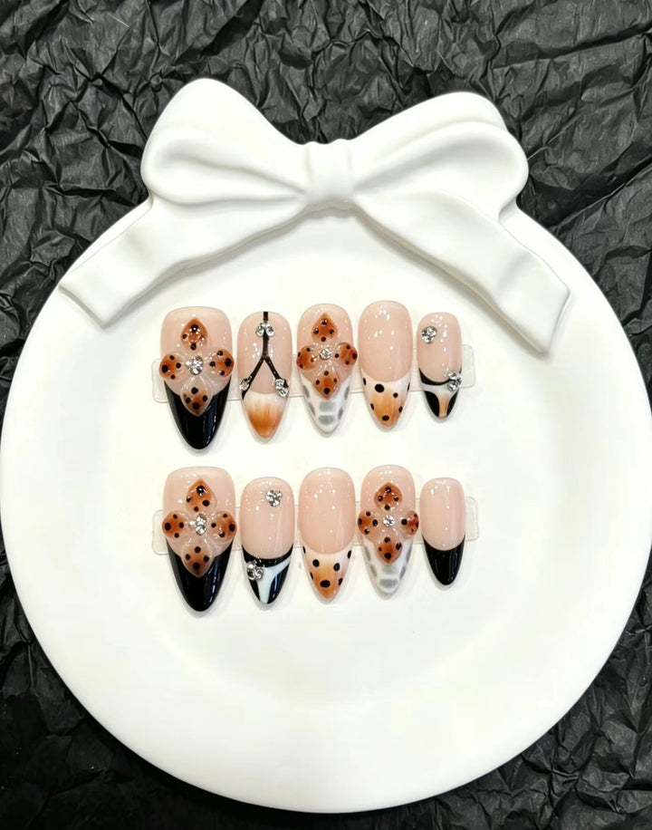 Decorative Press-On Nail Art Set with Floral and Whimsical Designs