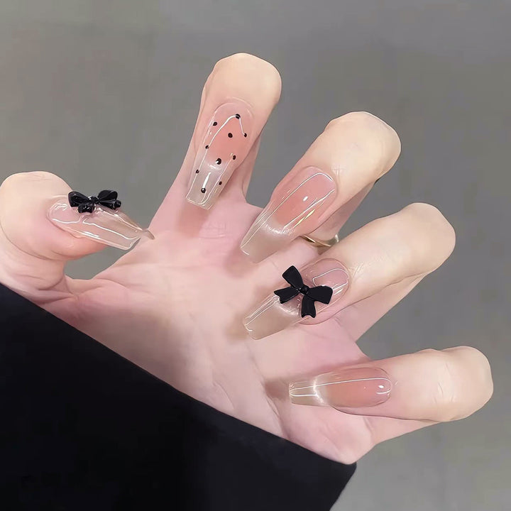 Elegant artificial nails with bow design Stornfield