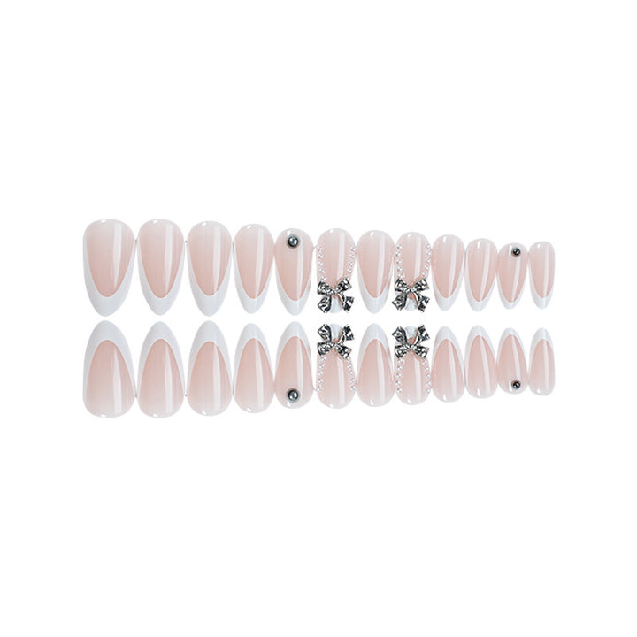 Glamorous artificial nails with sparkling 3D accents Stornfield