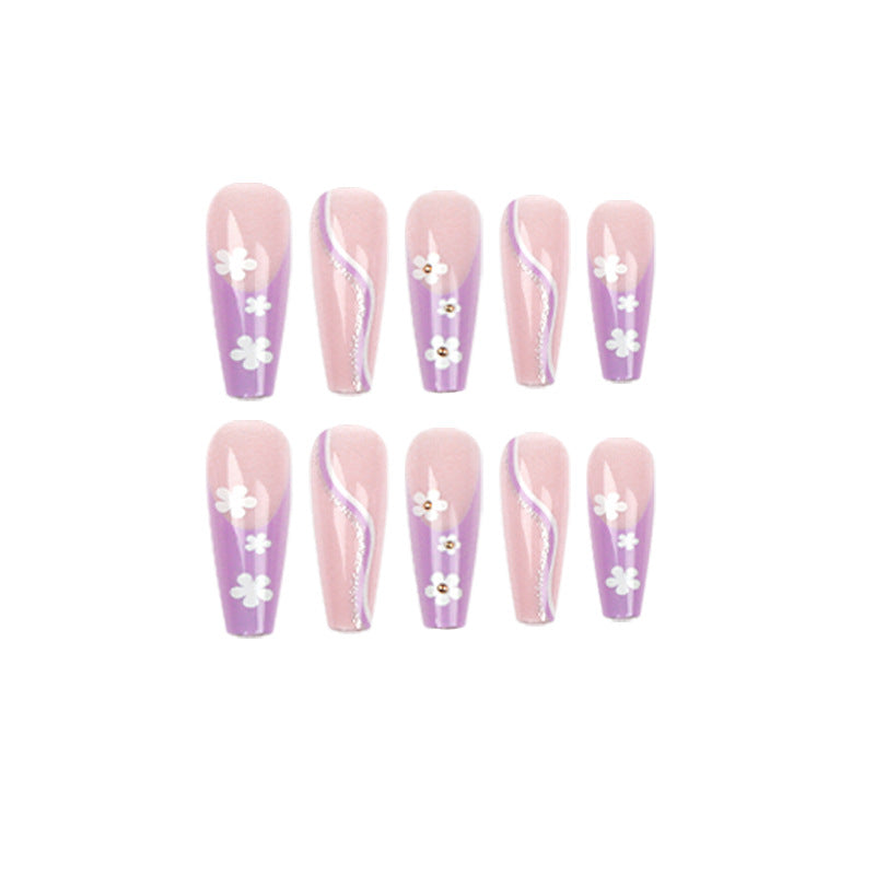 Creative nail art with floral accents Stornfield