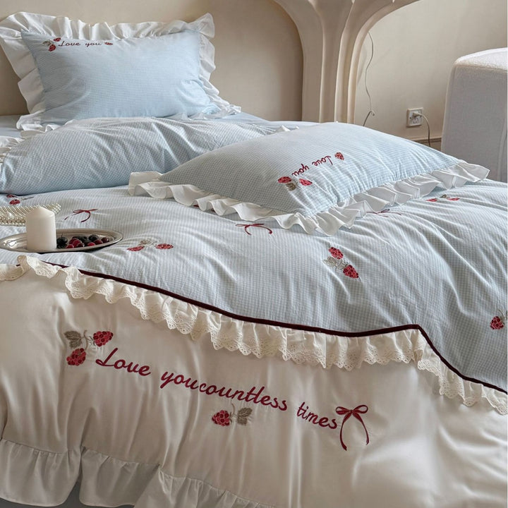 Bedding set made of breathable cotton blend with ruffle and flower bow embroidery
