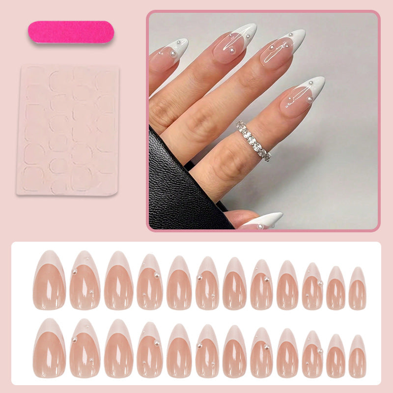 Artificial nail set with elegant French tip and shimmering pearl accents Stornfield