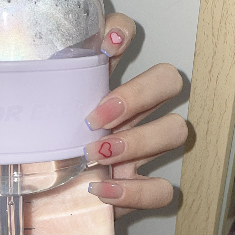 Artificial nails with heart accent and glamorous decorations Stornfield