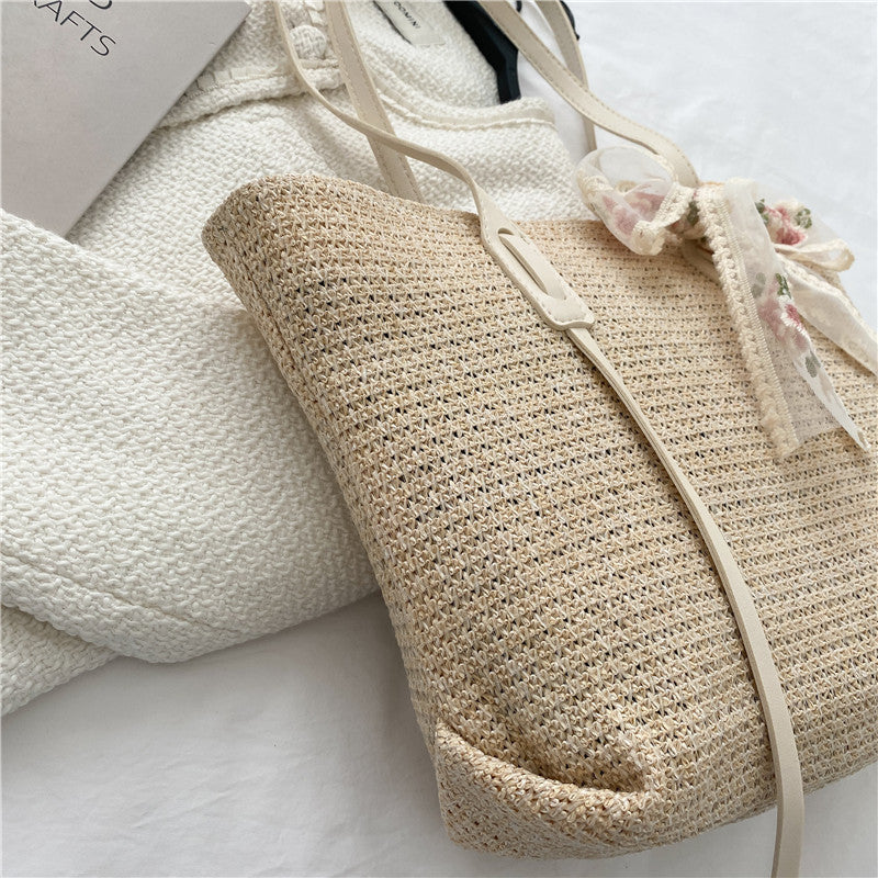 Elegant Woven Straw Tote Bag with Decorative Bow