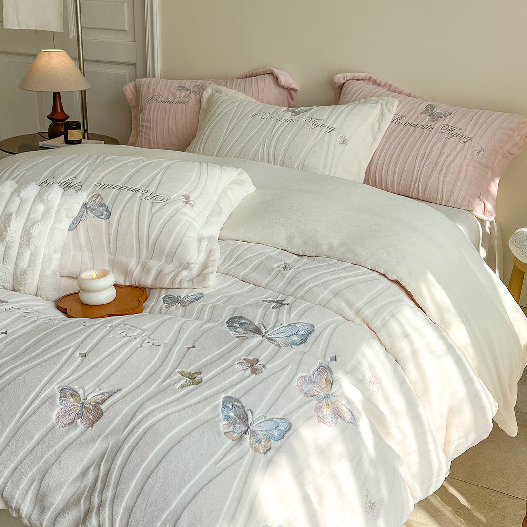 Cozy microfiber bedding with embroidered butterfly designs
