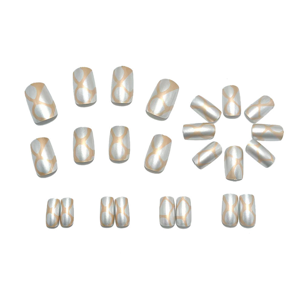 Elegant Artificial Nails with Metallic Design Stornfield