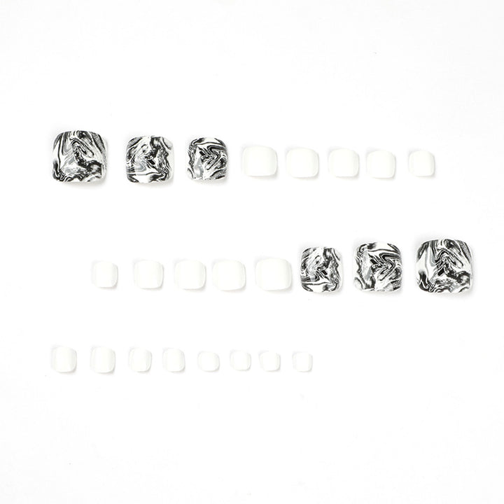 Artful toenail art in elegant marble design Stornfield