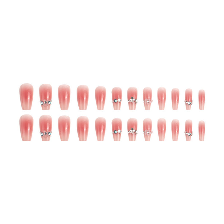 Artificial nail set with glamorous 3D decorations and shimmering accents Stornfield