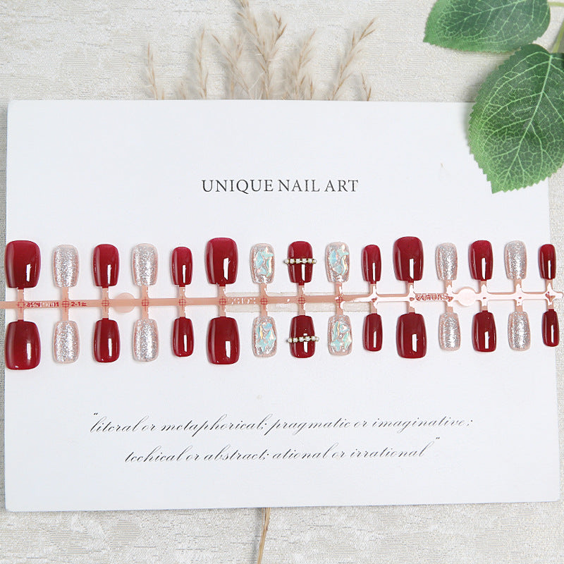 Glamorous artificial nail set with sparkling 3D applications and elegant embellishments Stornfield