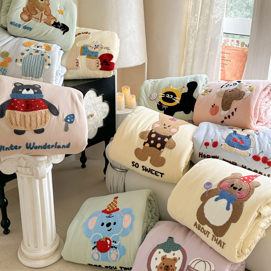 Children's bedding with tufted rabbit appliqué