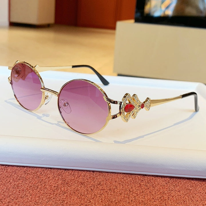 Ladies elegant rectangular sunglasses with glamorous embellishments Stornfield