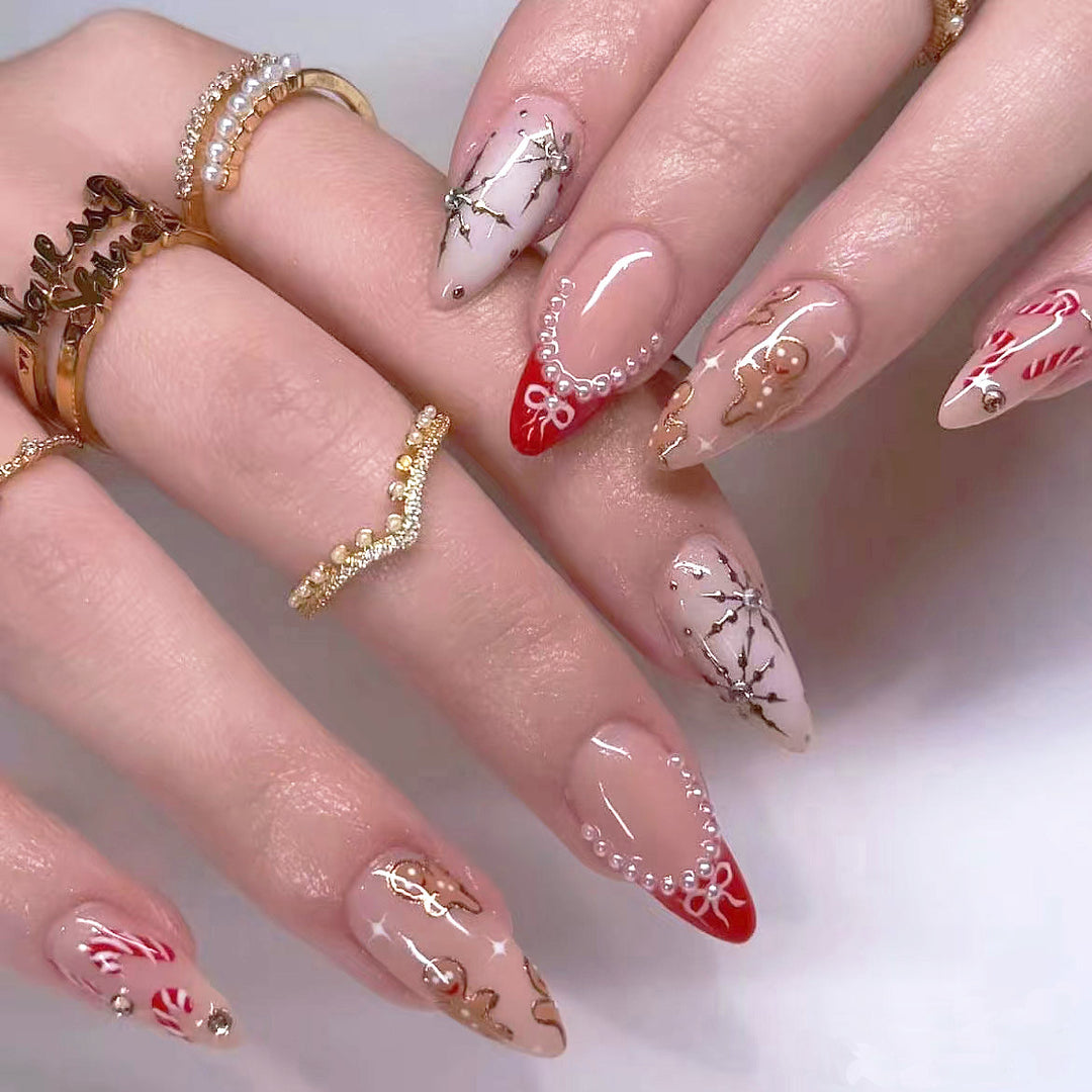 Acrylic nail set with glamorous golden accents Stornfield