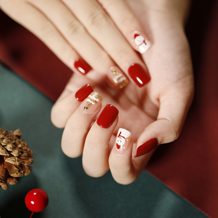 Elegant artificial nails with golden accents and floral design Stornfield