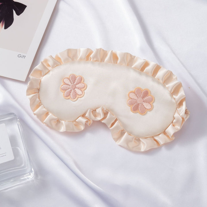 Women's embroidered satin sleep mask with gathered ruffled edge and soft padding Stornfield