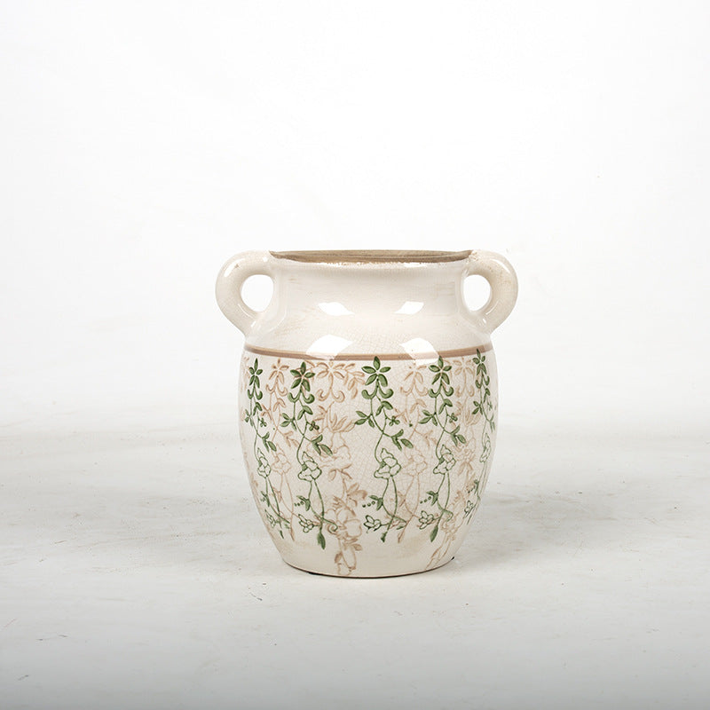 Decorative plant pot with floral accents Stornfield