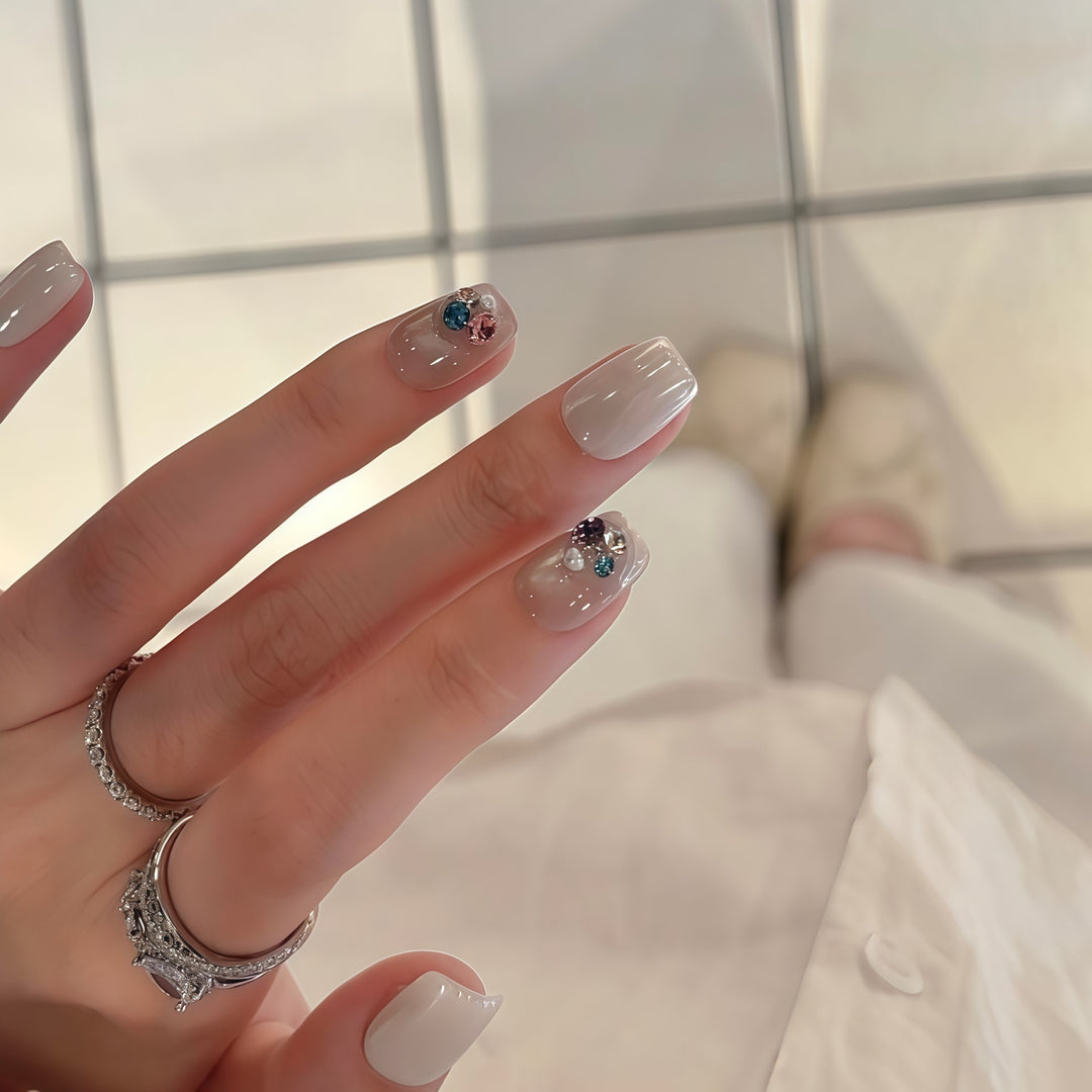Artificial nails with elegant jewelry accents Stornfield