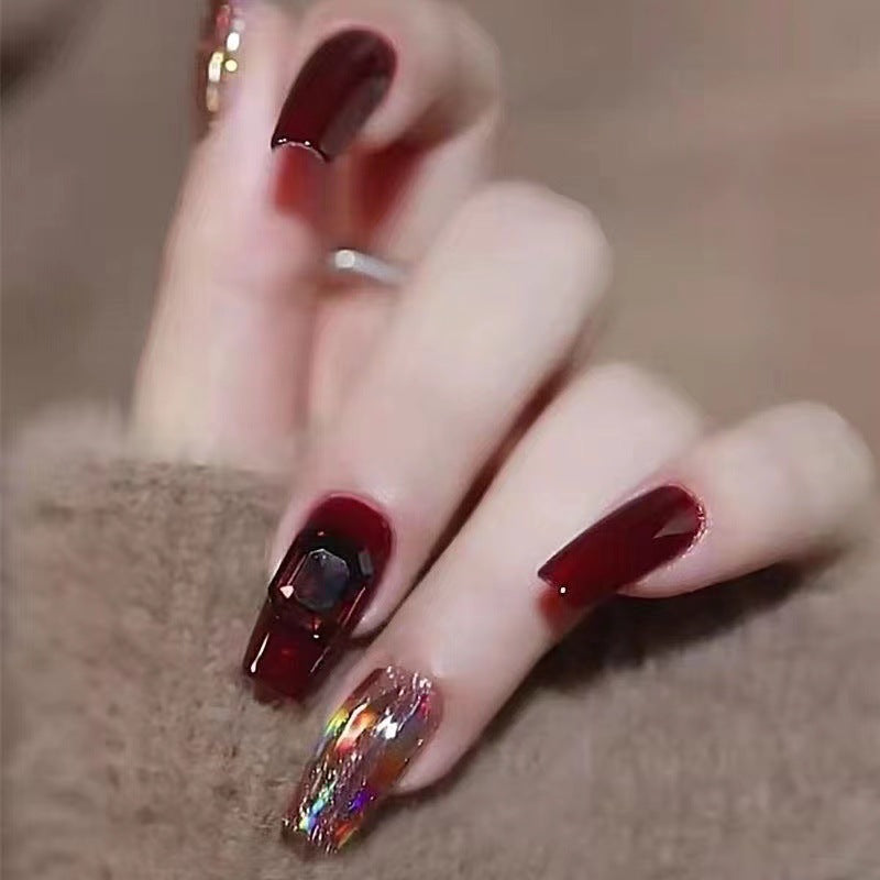 Glamorous artificial nails with crystal elements Stornfield