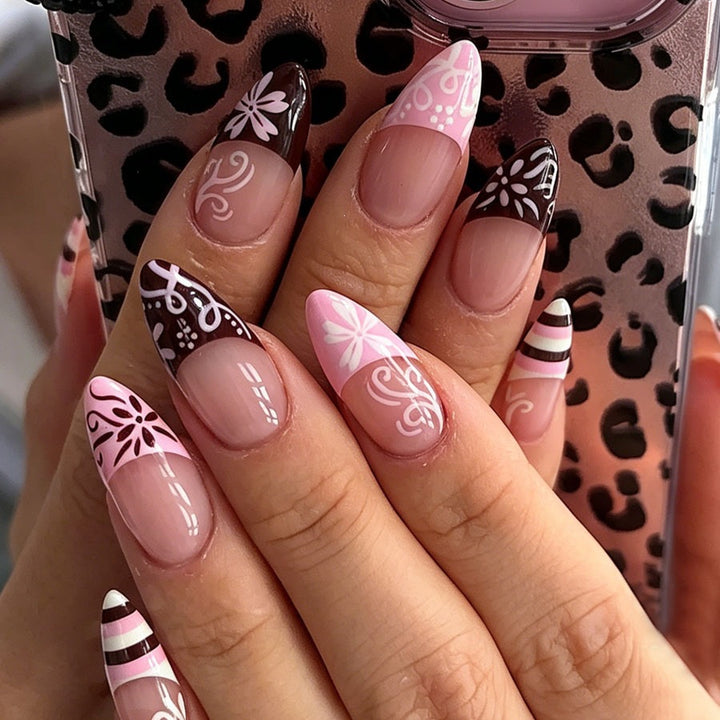 Artificial nail set with decorative flower-like and geometric designs Stornfield