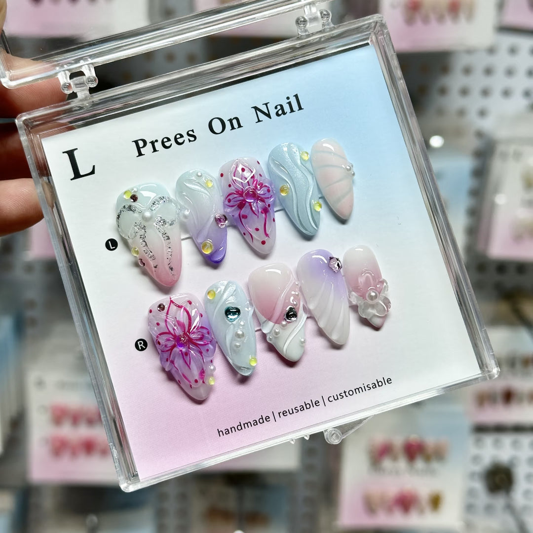 Artistic Press-On Nail Set with Floral and Green Accents
