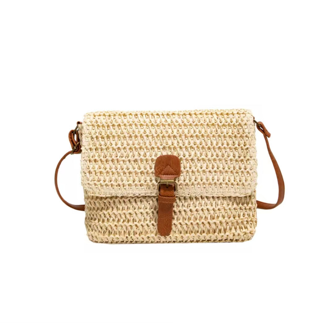 Handbag made of woven natural material with leather accents Stornfield
