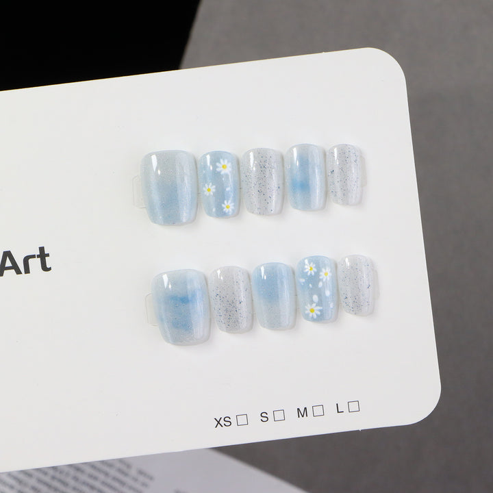 Artistic Press-On Nail Set with Floral Accents Stornfield 1788497744