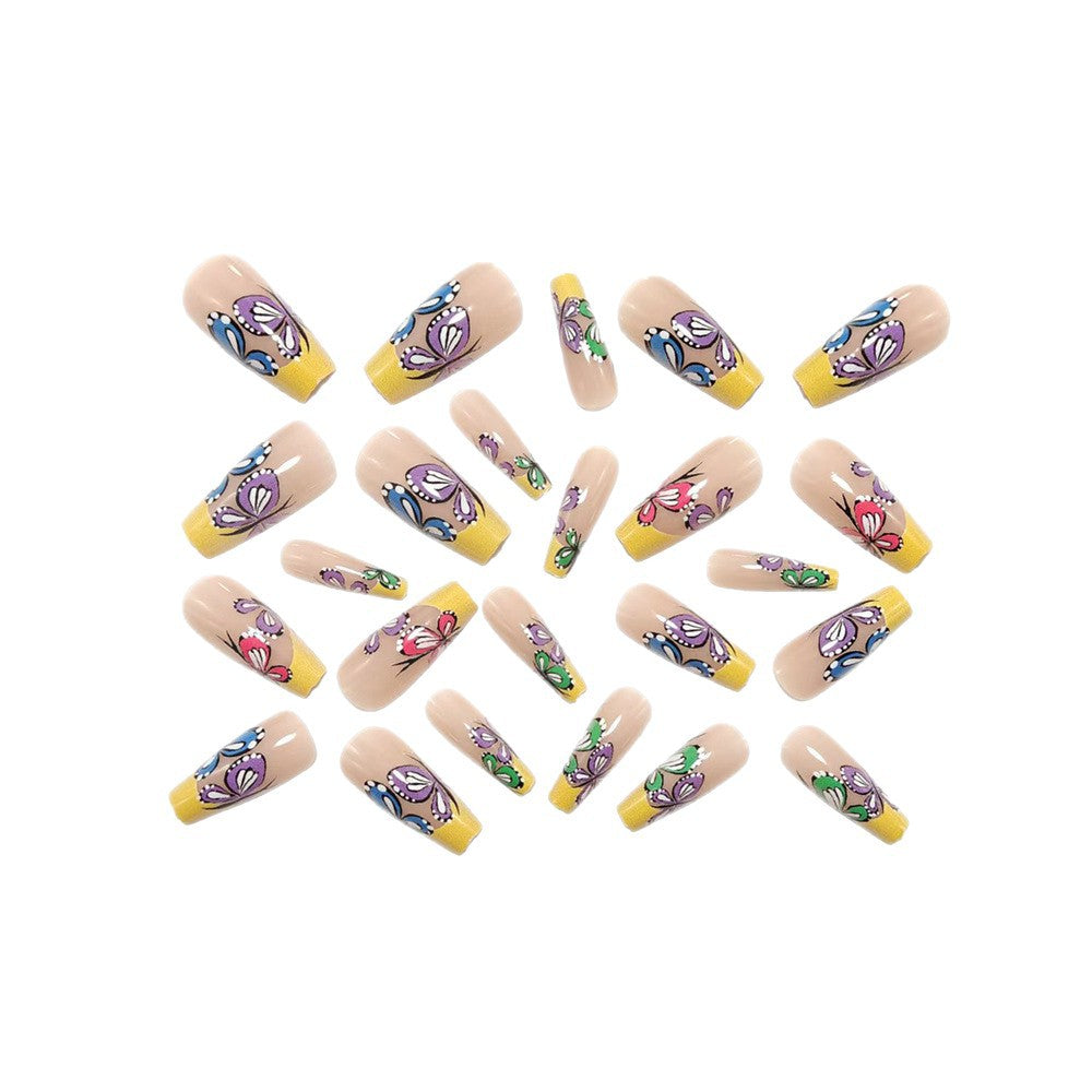 Nail set with intricate butterfly design Stornfield