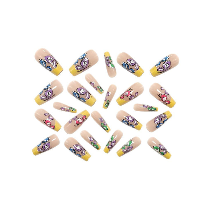 Nail set with intricate butterfly design Stornfield