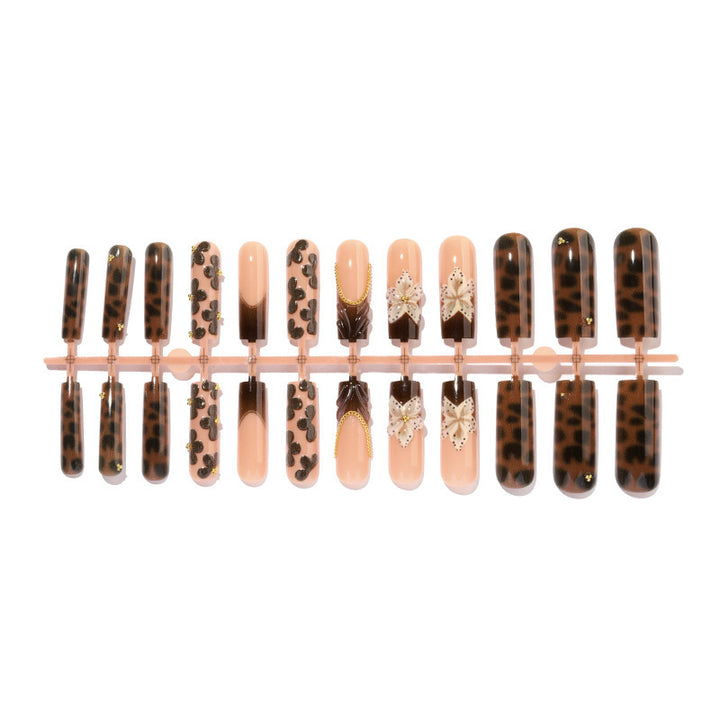 Nail design with floral accents and elegant details Stornfield