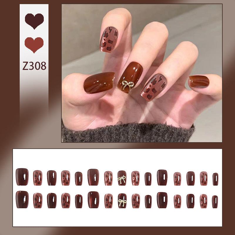 Nail set with elegant leopard pattern and luxurious accents Stornfield