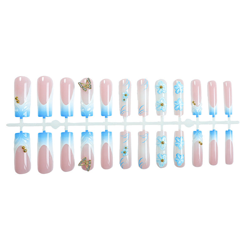 Artistic Press-On Nail Set with Floral and Butterfly Designs Stornfield
