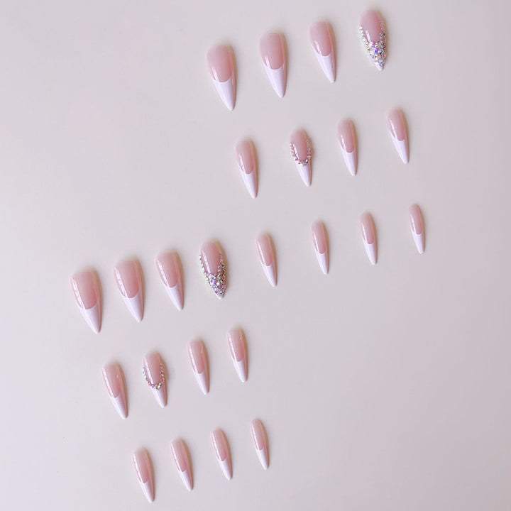 Artificial nail set with glamorous rhinestone decorations and elegant tips Stornfield