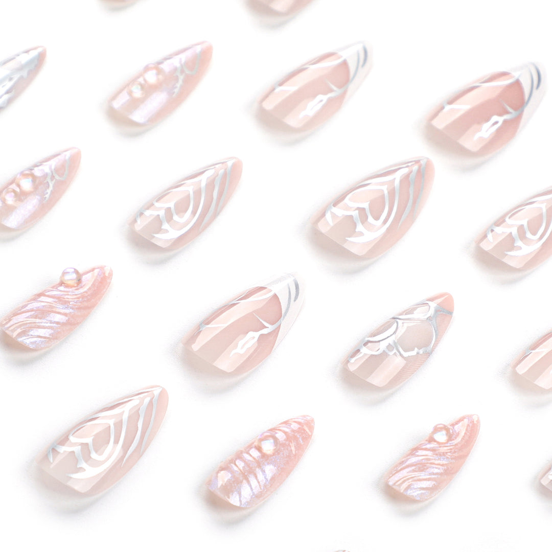 Artistic stiletto nails with holographic effects Stornfield