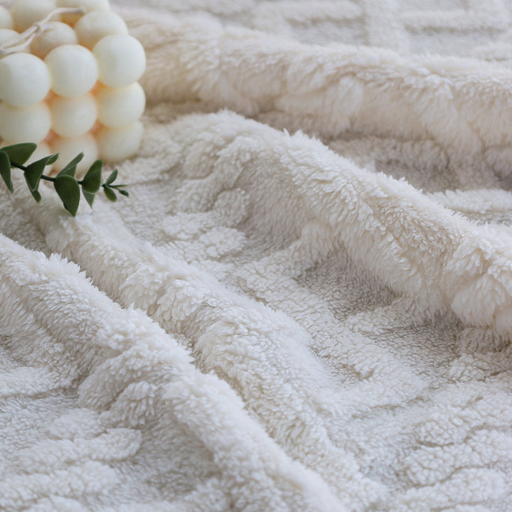Cuddle blanket with textured surface