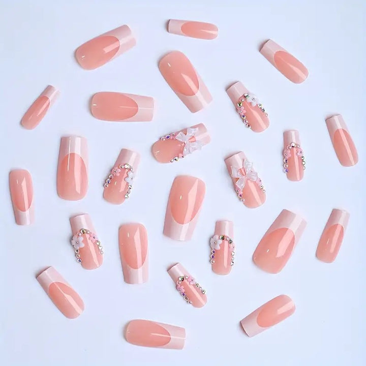 Artificial nails with elegant 3D bows and glitter accents Stornfield