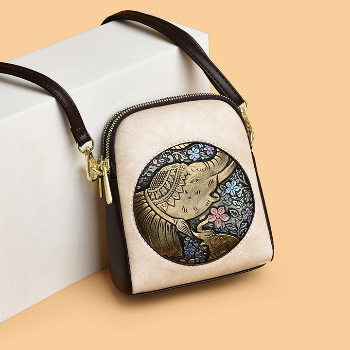 Artistic Embossed Leather Crossbody Bag