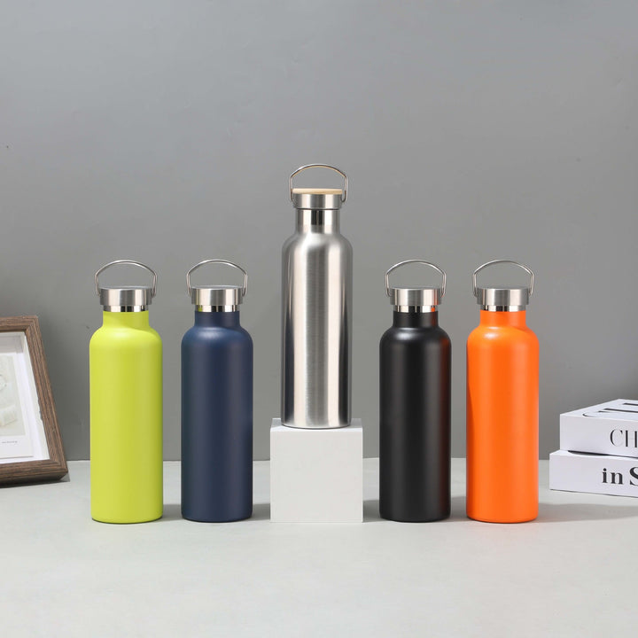 Women's stainless steel insulated drinking bottle with sustainable bamboo lid Stornfield