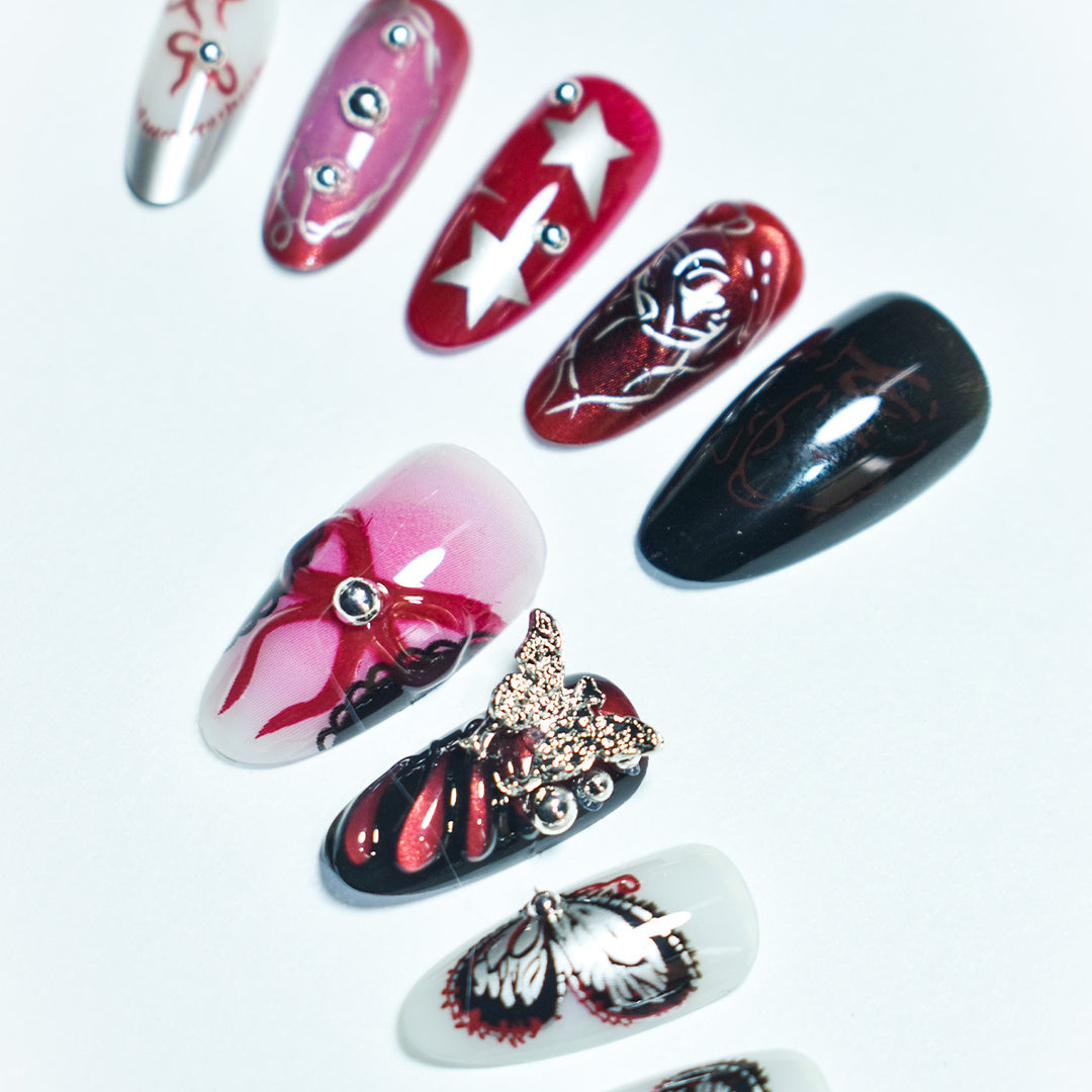 Artistic Press-On Nail Set with Butterfly and Star Details Stornfield