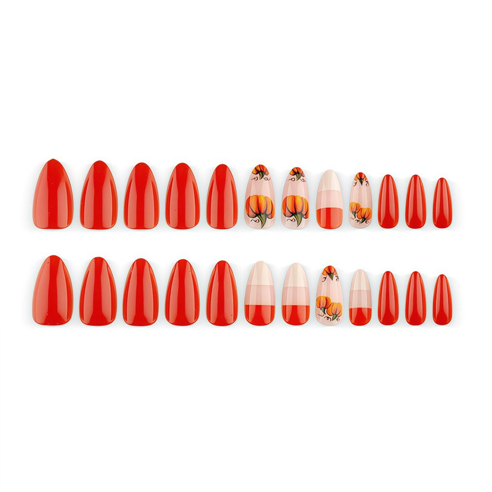 Artificial nails in autumn pumpkin design Stornfield