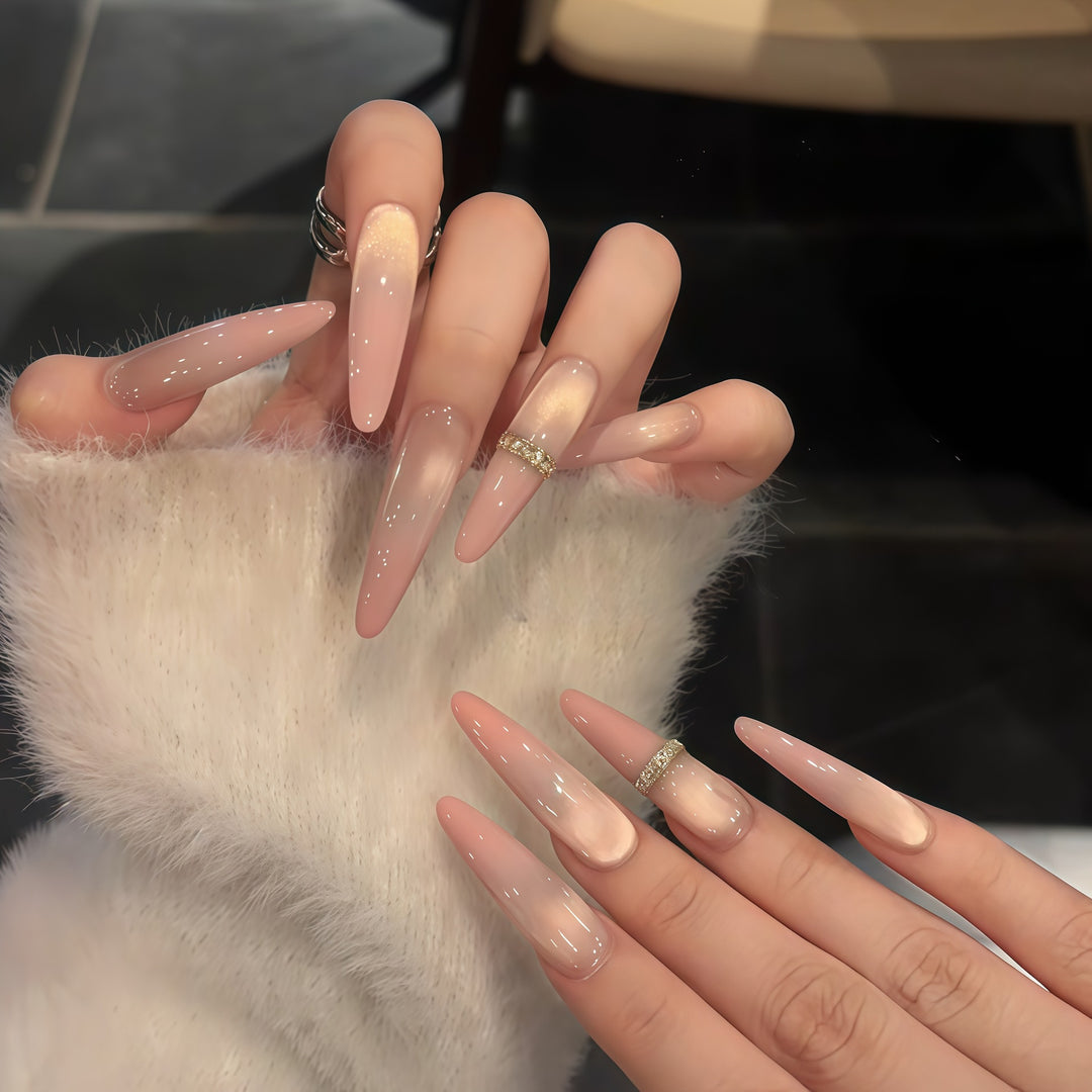 Glamorous artificial nails with elegant glitter and rhinestone application Stornfield