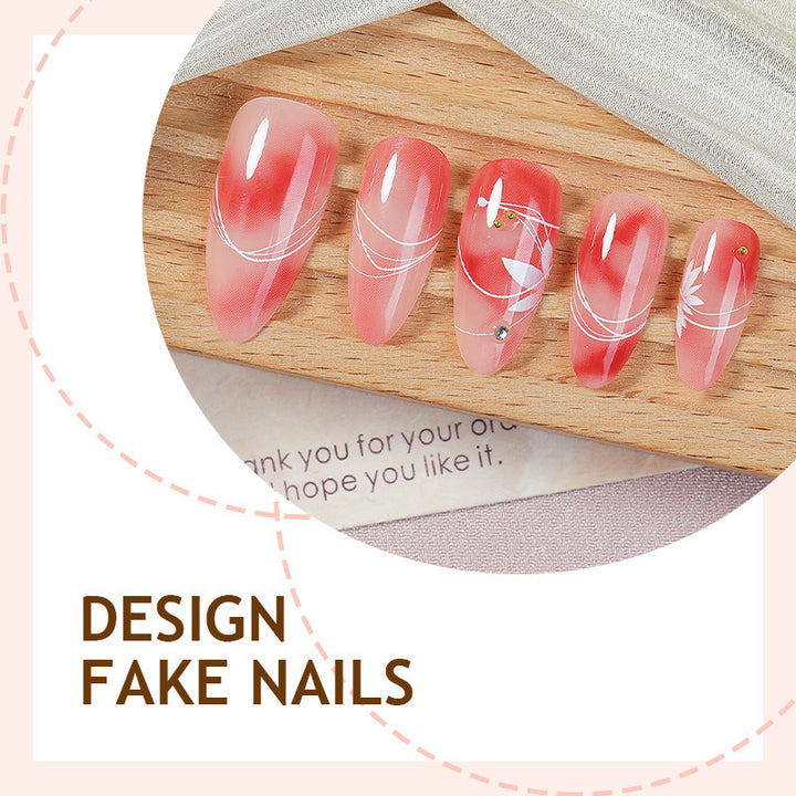 Acrylic nail set with elegant ombre design and floral accent Stornfield