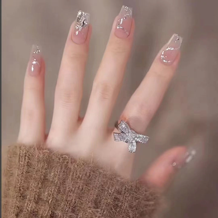 Glamorous artificial nails with glitter accents Stornfield