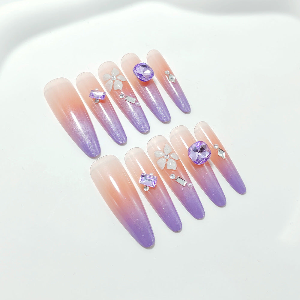 Artistic fingernails with delicate rhinestone details Stornfield