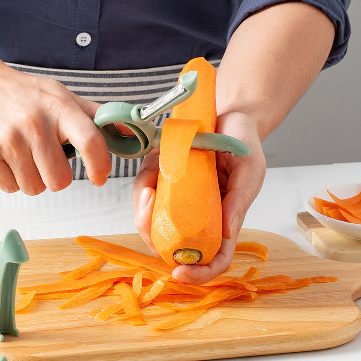 Multifunctional vegetable and fruit cutter with safety mechanism Stornfield