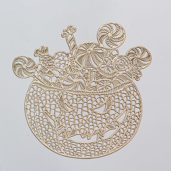 Filigree laser-cut pumpkin placemat made of wood for Halloween table decoration